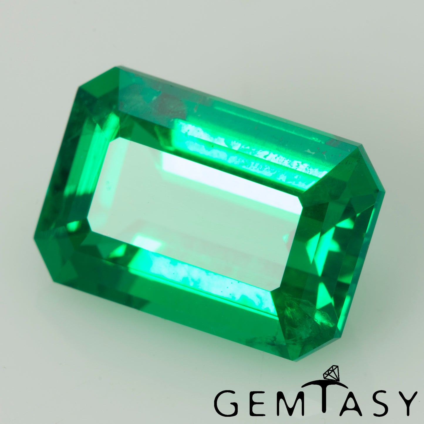 Cut stone - Emerald Colombian hydrothermal lab grown, facet Octagon 11x7mm 2.20-2.61ct