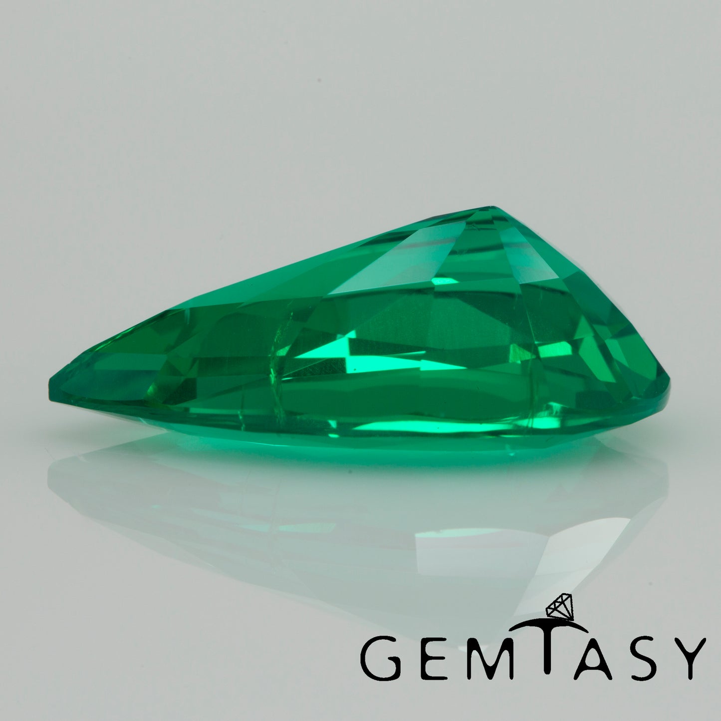 Cut stone - Emerald Colombian hydrothermal lab grown, facet Pear 17x10mm 5.22-5.28ct