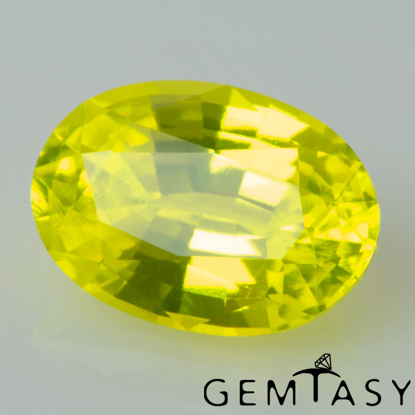 Pierre taillée - GAGG Jaune fluo Czochralski (Tiré) cultivé en laboratoire, facette Ovale 10x7mm 4,88-5,24ct