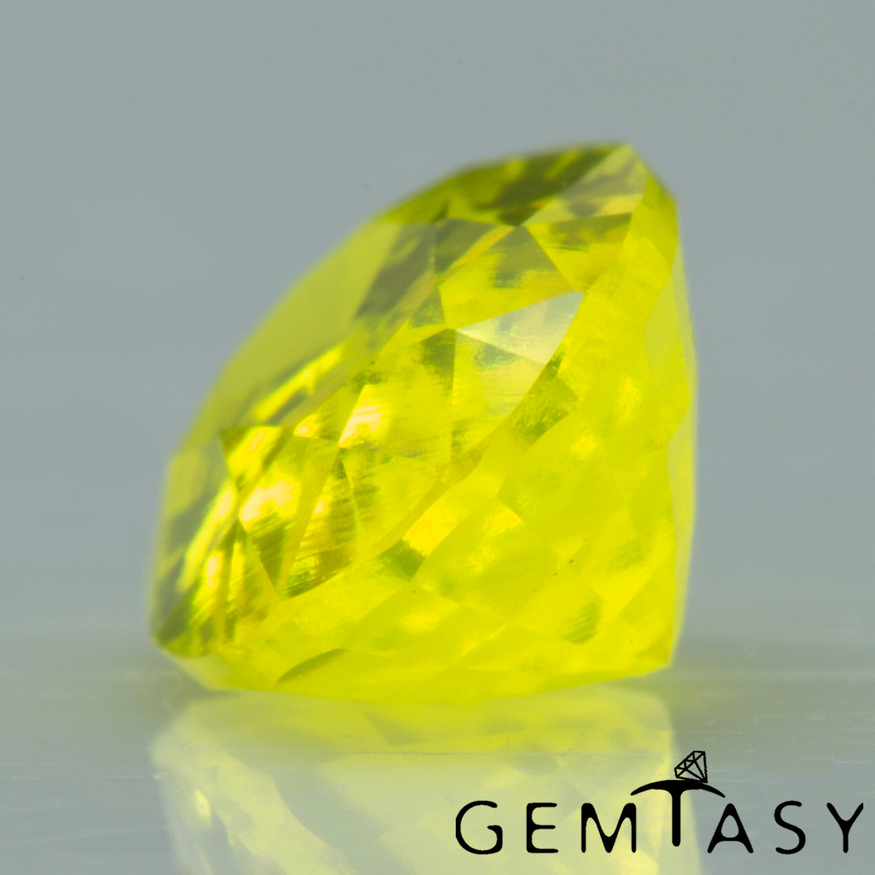 Pierre taillée - GAGG Jaune fluo Czochralski (Tiré) cultivé en laboratoire, facette Ovale 10x7mm 4,88-5,24ct