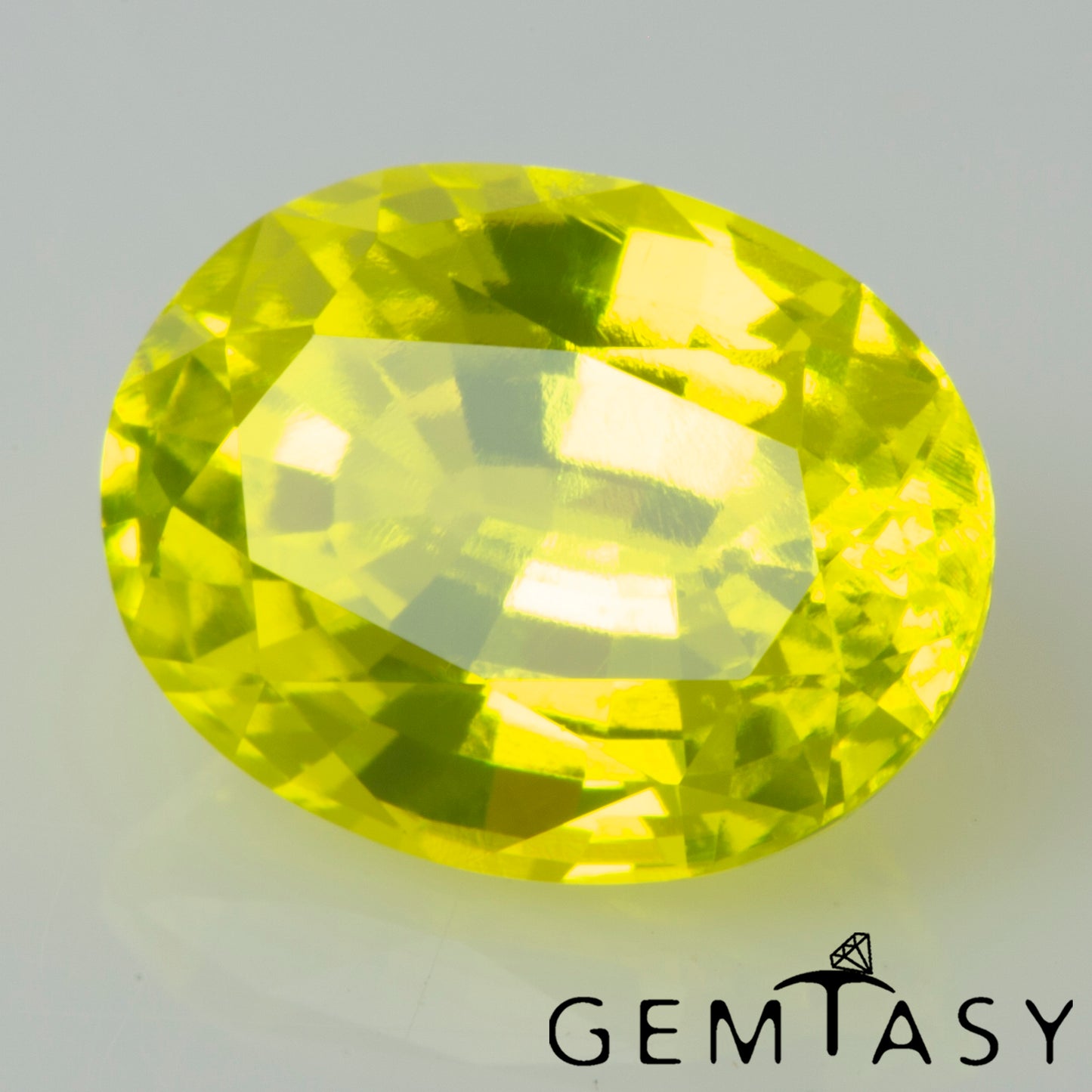 Pierre taillée - GAGG Jaune fluo Czochralski (Tiré) cultivé en laboratoire, facette Ovale 9x7mm 4,62-4,93ct