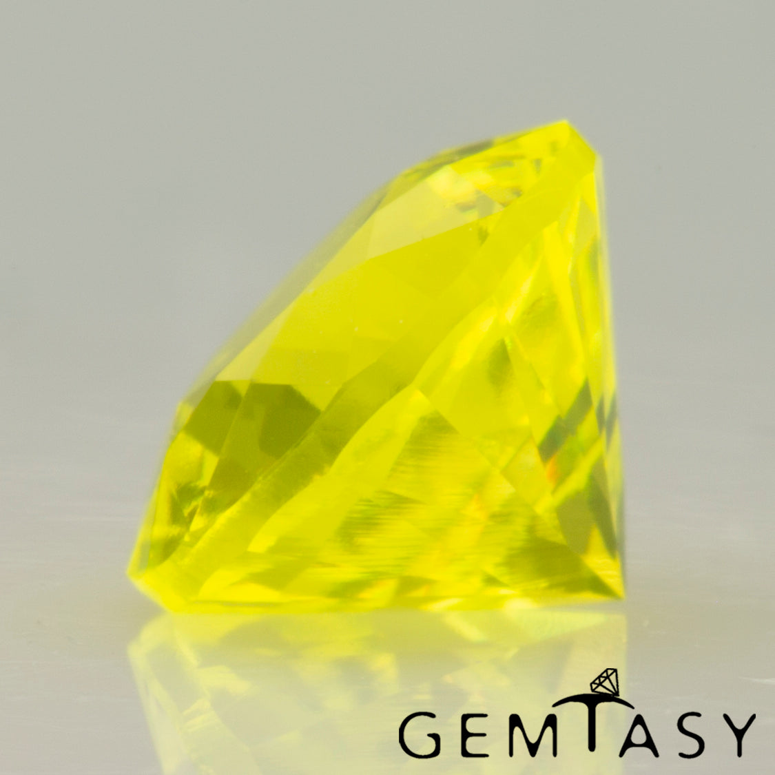 Pierre taillée - GAGG Jaune fluo Czochralski (Tiré) cultivé en laboratoire, facette Rond 6mm 1,83-2,24 ct