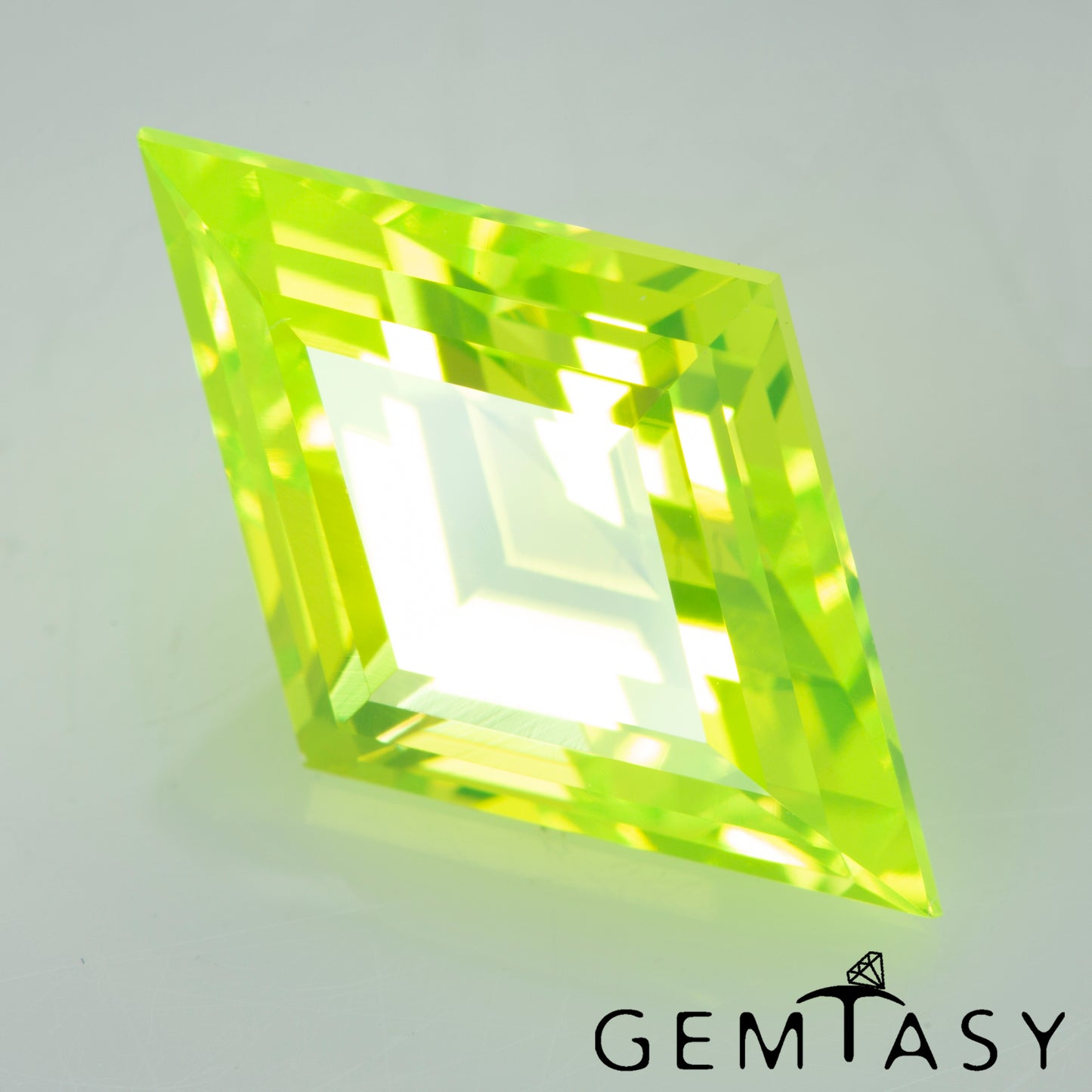 Cut stone - LuAG Yellow neon Czochralski (Pulled) lab grown, facet Lozenge cut 17x11mm 11.34-11.91ct