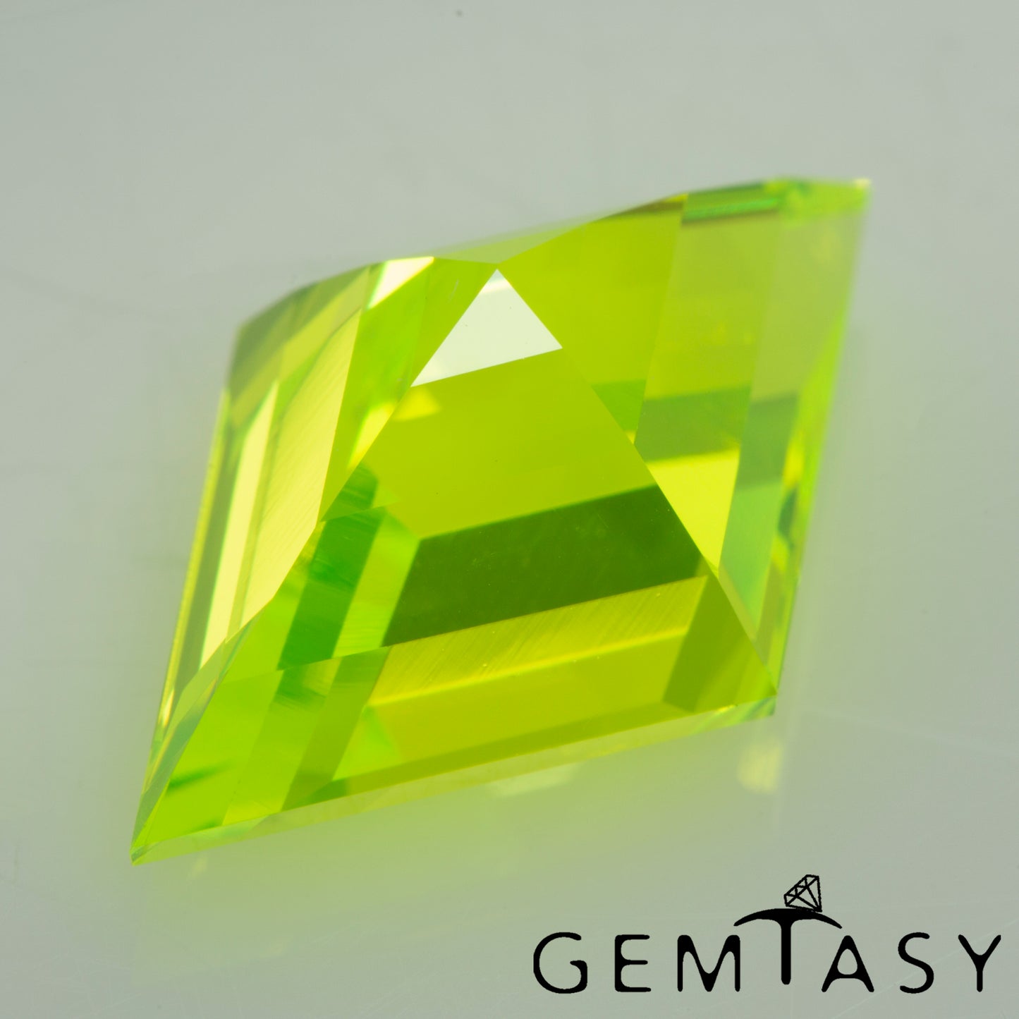 Cut stone - LuAG Yellow neon Czochralski (Pulled) lab grown, facet Lozenge cut 17x11mm 11.34-11.91ct