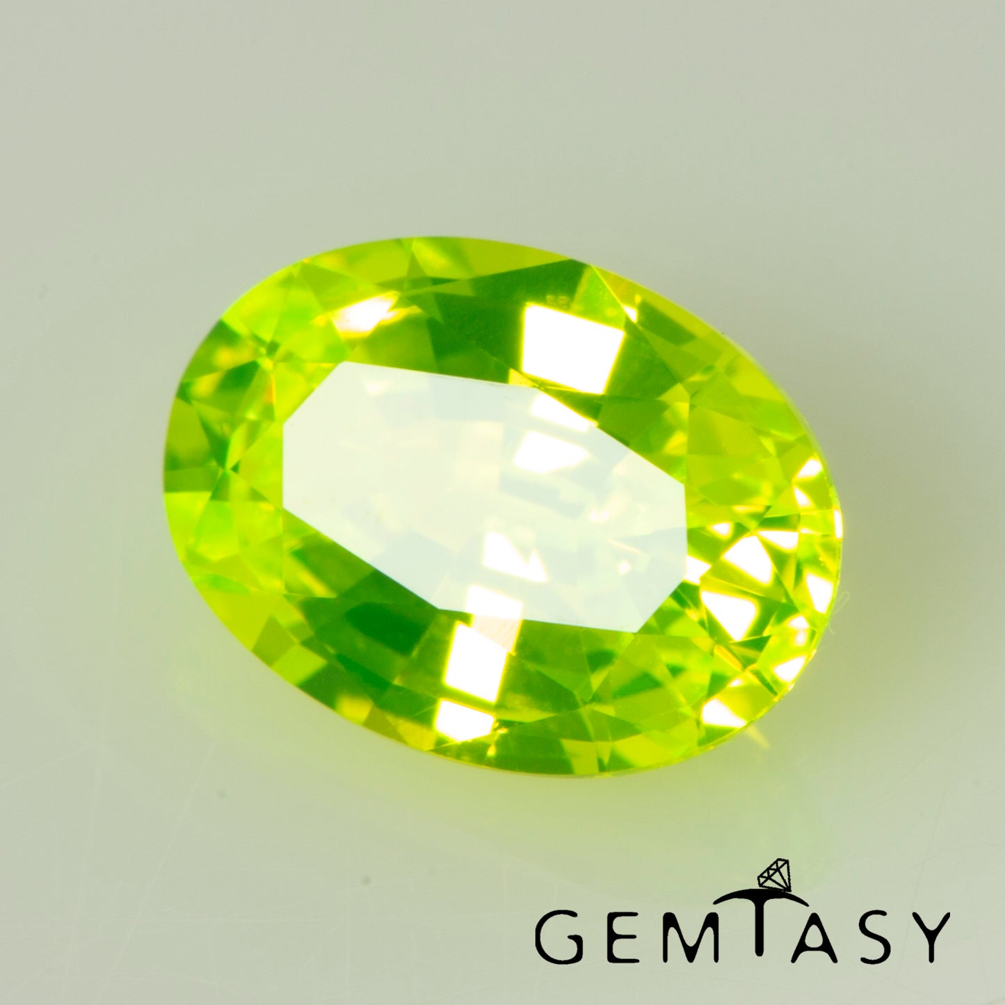 Cut stone - LuAG Yellow neon Czochralski (Pulled) lab grown, facet Oval 7x5mm 1.62-1.84ct