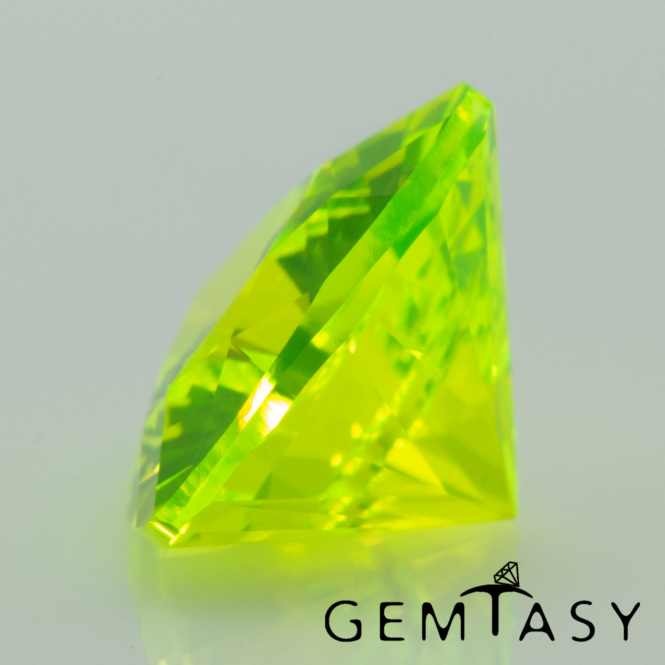 Cut stone - LuAG Yellow neon Czochralski (Pulled) lab grown, facet Trilliant 9x9x9mm 4.76-5.16ct