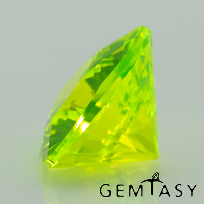 Cut stone - LuAG Yellow neon Czochralski (Pulled) lab grown, facet Trilliant 9x9x9mm 4.76-5.16ct