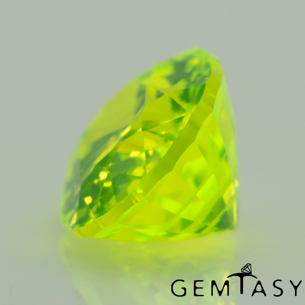 Cut stone - LuAG Yellow neon Czochralski (Pulled) lab grown, facet Oval 8x6mm 2.64-2.92ct