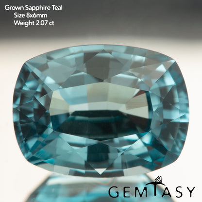 Schliffstein – tealfarbener Montana-Saphir, im Czochralski-Verfahren gezogen, im Labor gezüchtet, Kissenschliff 9x7mm 2.84-3.2ct
