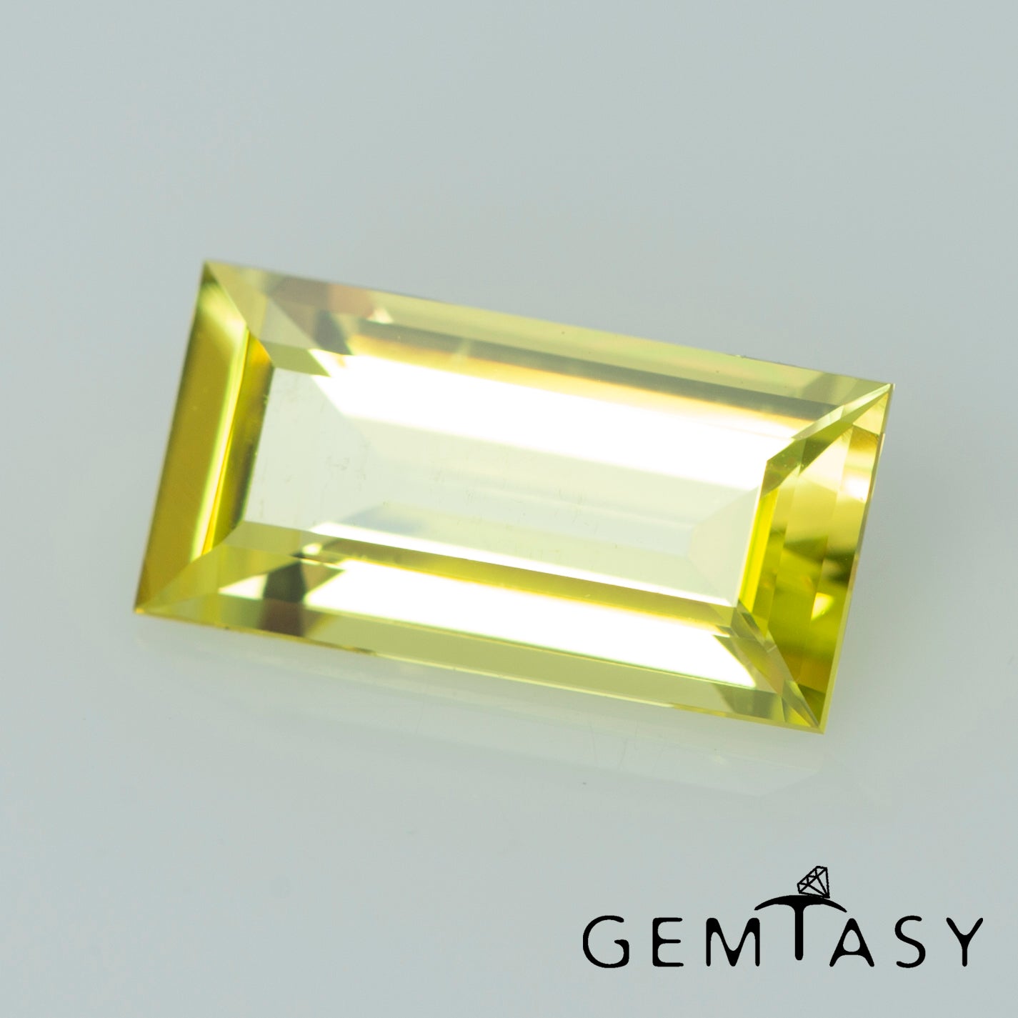 Pierre taillée - Saphir Jaune Czochralski (Tiré) cultivé en laboratoire, facette Baguette 10x5mm 1.75ct