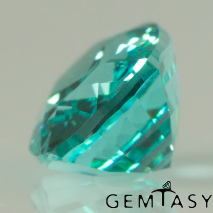 Pierre taillée - Paraiba YAG Czochralski (Tiré) cultivé en laboratoire, facette Coussin 7x5mm 1,51-1,84 ct