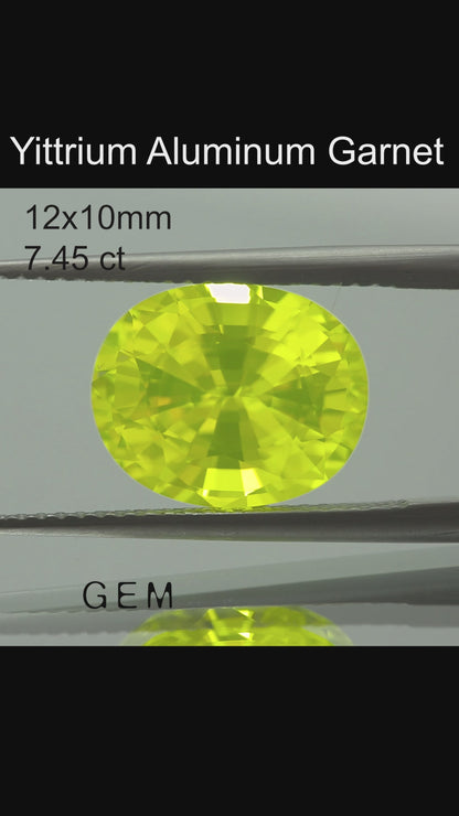 Cut stone - YAG Yellow neon Czochralski (Pulled) lab grown, facet Oval 12x10mm 7.45ct